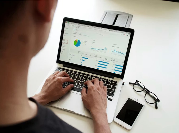 Person working on statistical data